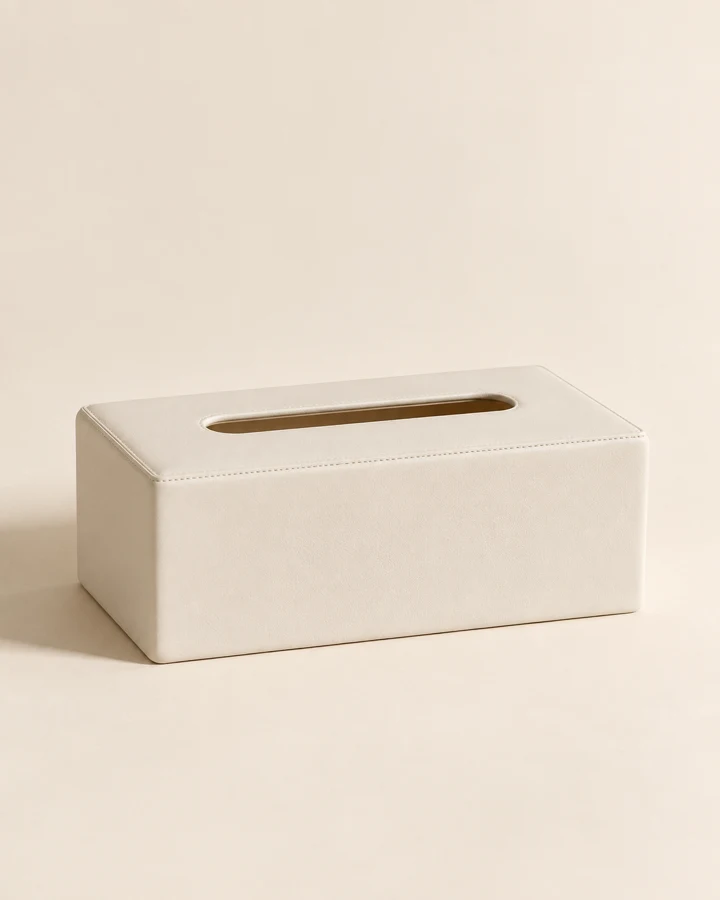 A minimal shape in warm white. One tissue box cover; tissues not included.